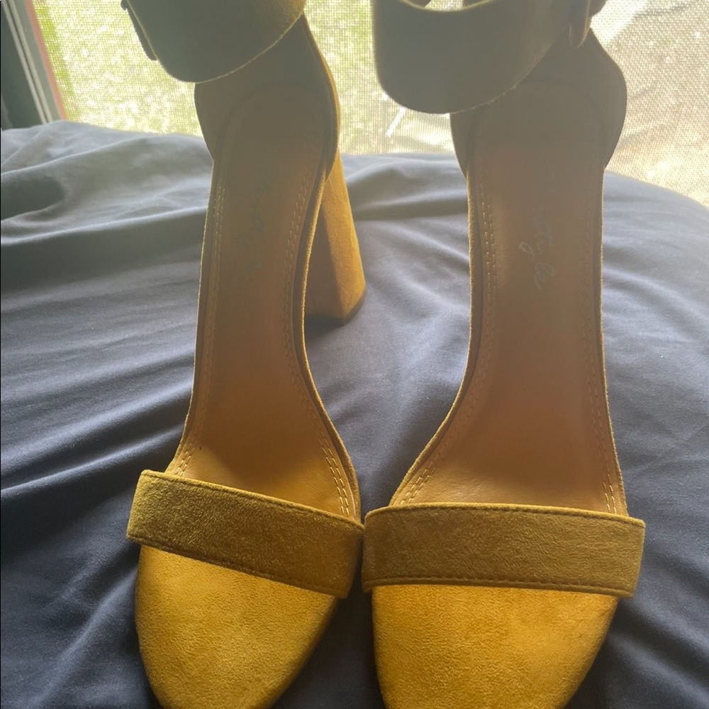 Mustard yellow heels.